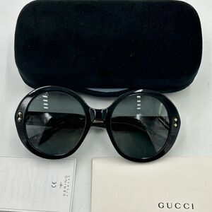 Women’s Gucci round frame acetate sunglasses made in Italy